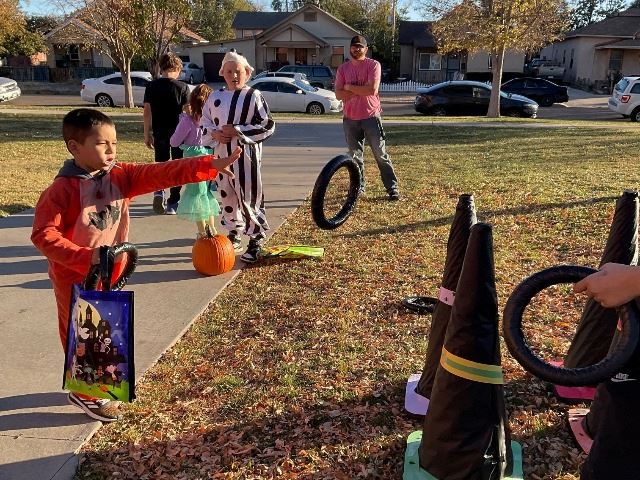 Child playing outside games at El Centro's Trunk n Treat 2022