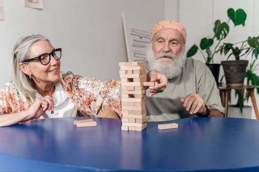 Elders playing Jenga