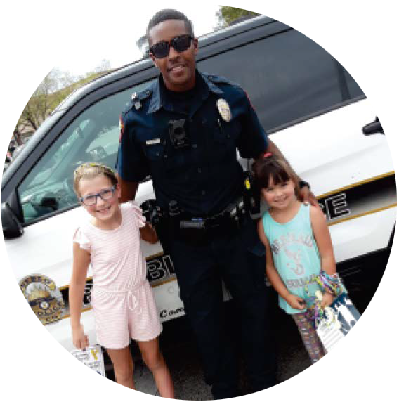 Police officer with two children