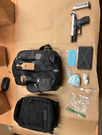 Photo of Both Backpacks, Narcotics and Firearm