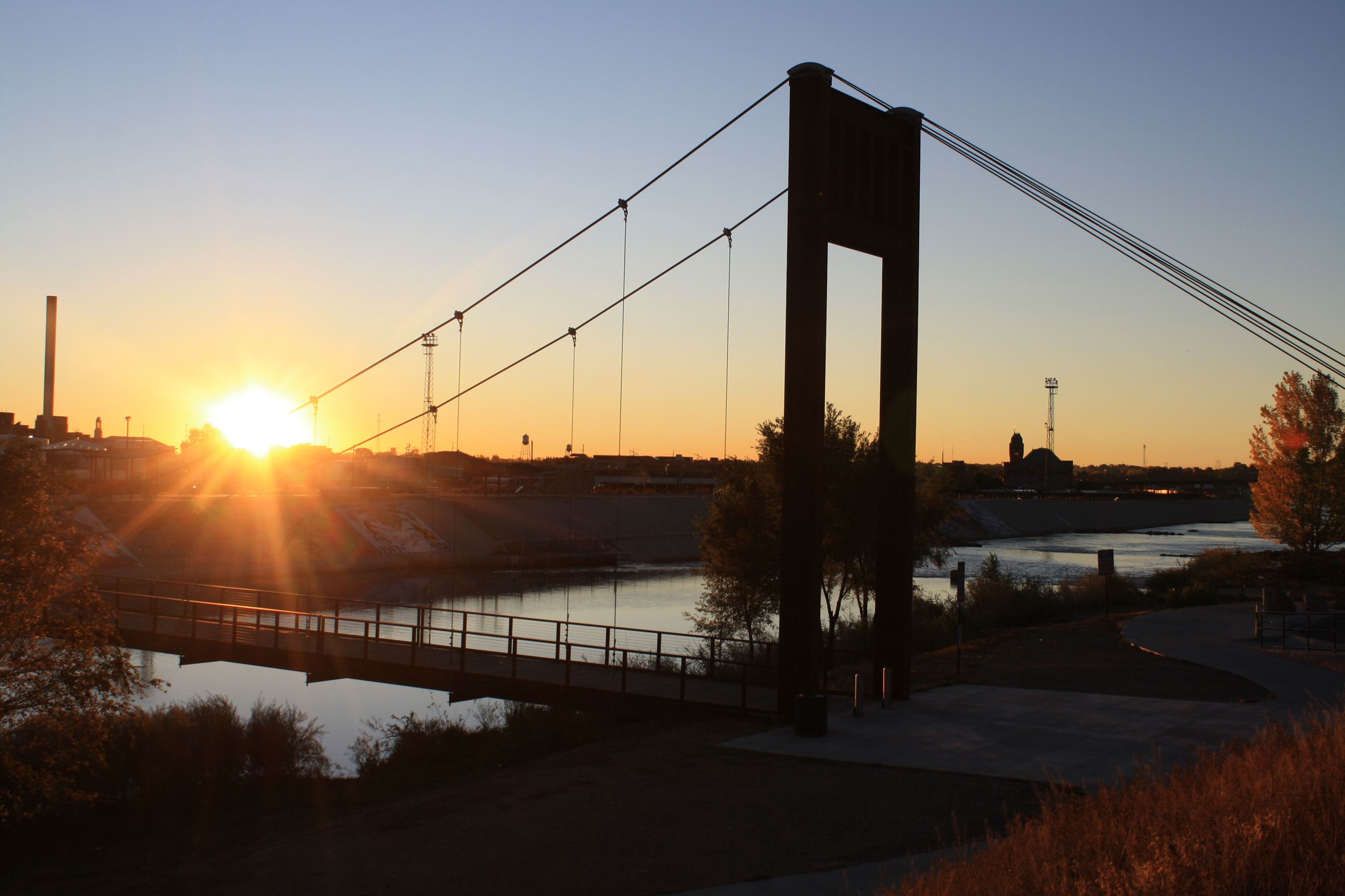Sunrise overlooking the Levee, Charles W. Lee Bridge and the Arkansas River.